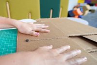 Make cutting cardboard easy for kids with the InvenTABLE