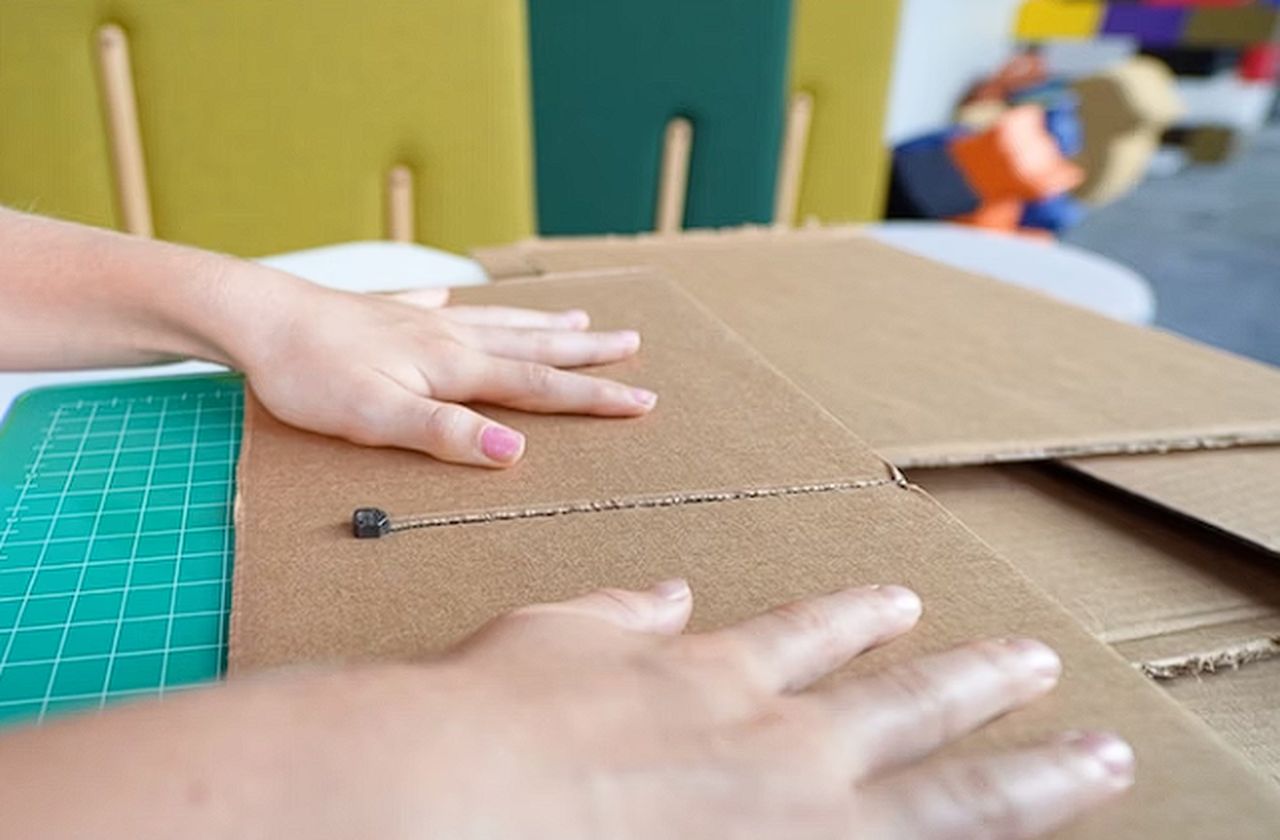 Make cutting cardboard easy for kids with the InvenTABLE